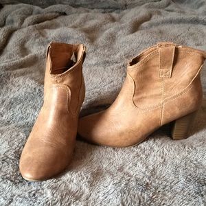 Brown heeled booties.